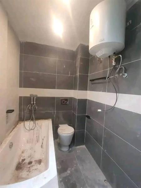 Bel Appartement Avec Baignoire Eau Chaude Gardien Forrage Prking À Odza 3Chambres 2Douches 